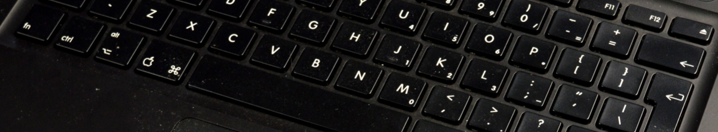 Black MacBook keyboard with flat keycaps